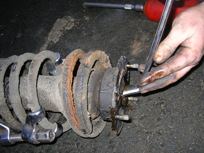 How to replace front suspension springs and shocks/struts on Volvo 240